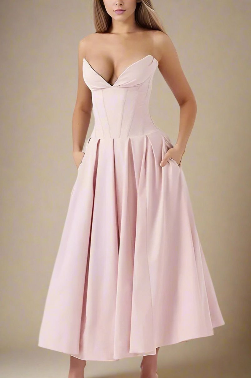Woman wearing a figure flattering Gabbi Bodycon Midi Dress - Dusty Pink BODYCON COLLECTION