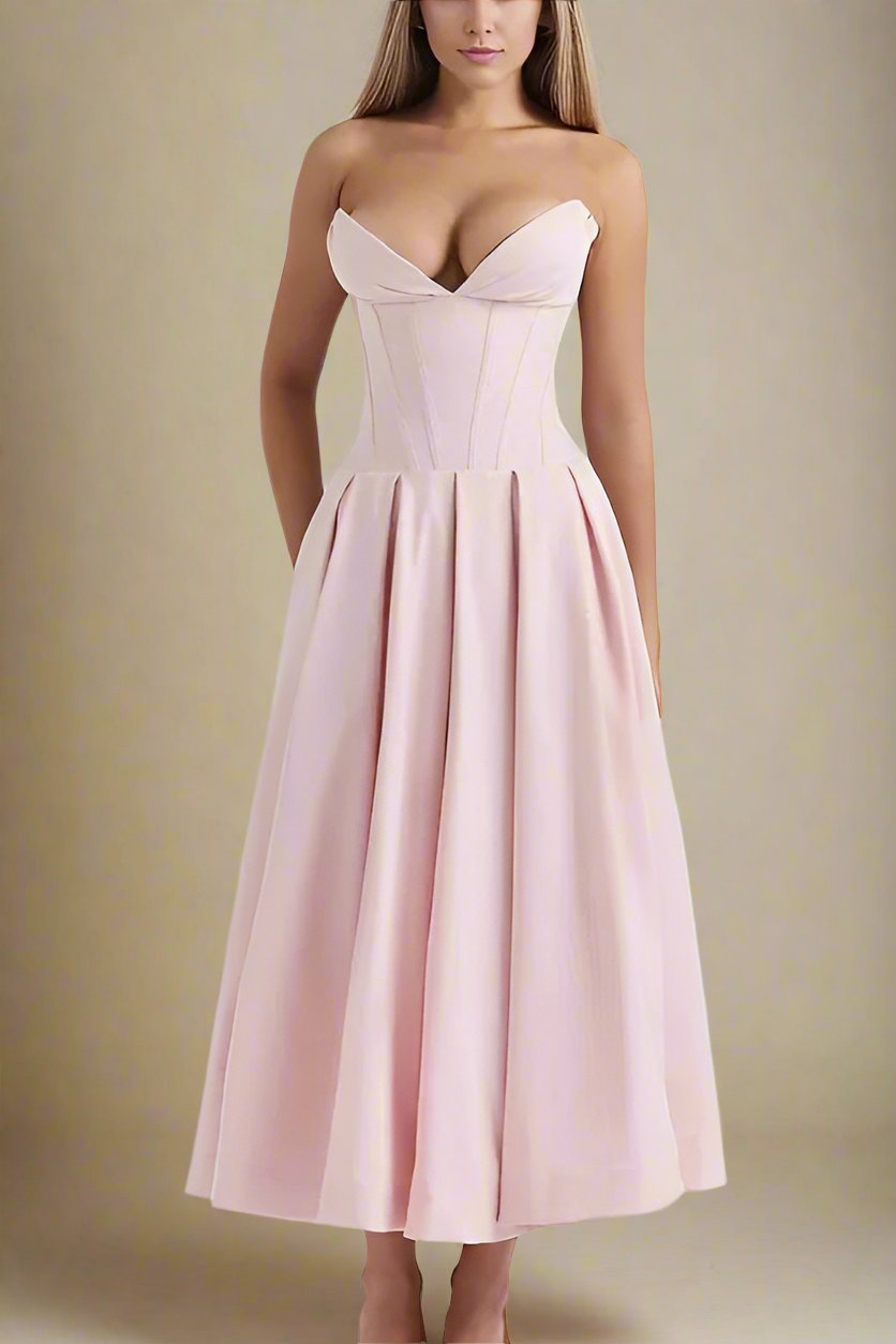 Woman wearing a figure flattering Gabbi Bodycon Midi Dress - Dusty Pink BODYCON COLLECTION