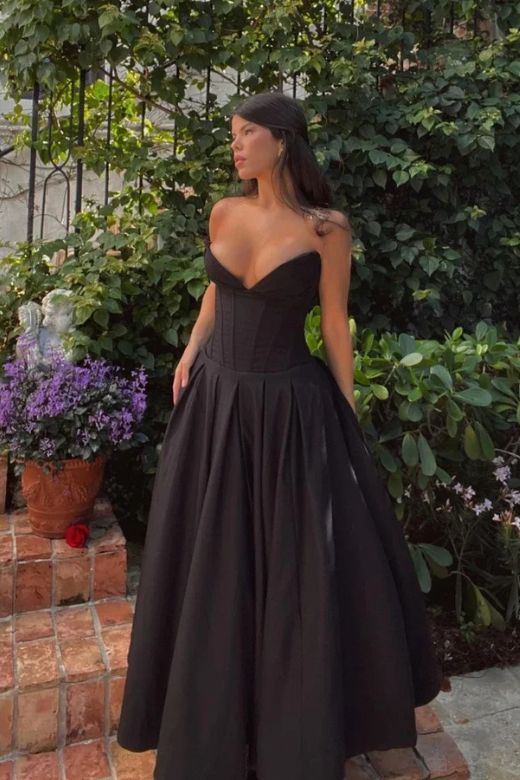 Woman wearing a figure flattering Gabbi Bodycon Midi Dress - Dusty Pink BODYCON COLLECTION