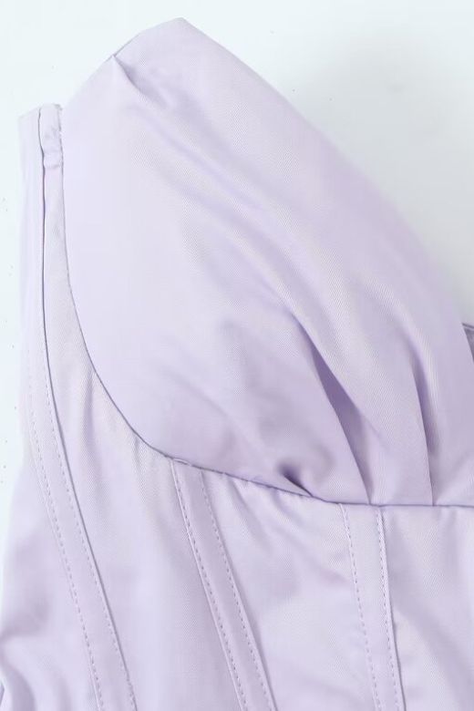 Woman wearing a figure flattering Gabbi Bodycon Midi Dress - Lavender Purple BODYCON COLLECTION