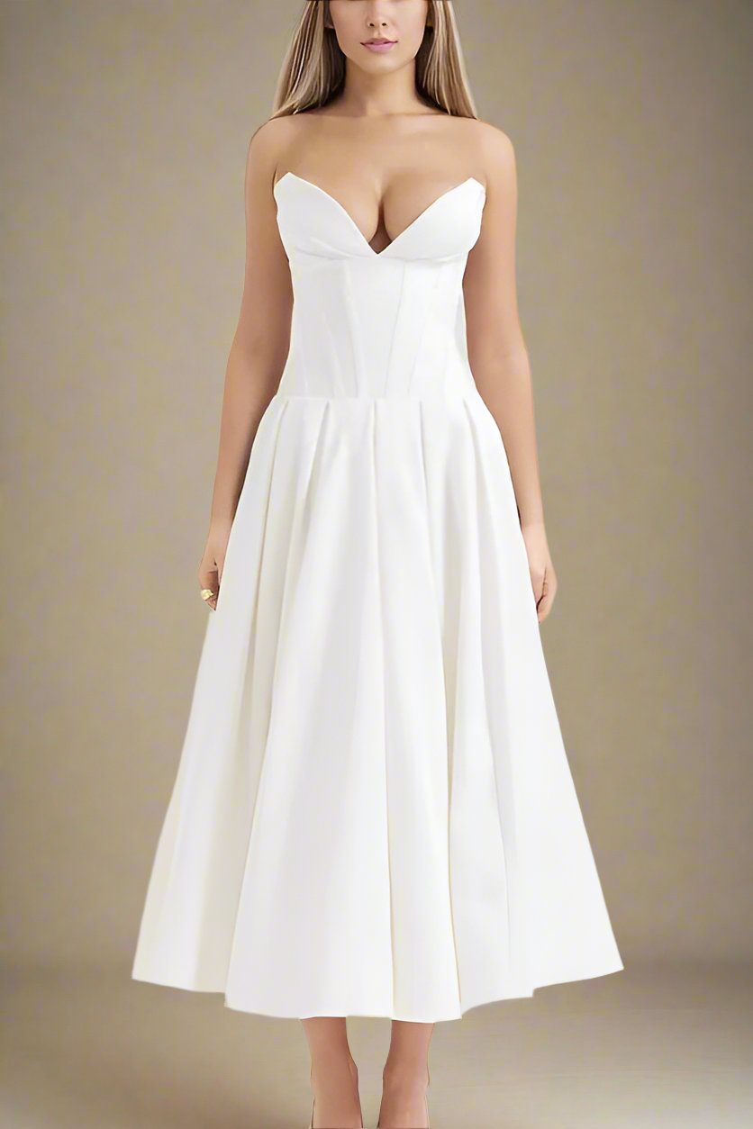 Woman wearing a figure flattering Gabbi Bodycon Midi Dress - Pearl White BODYCON COLLECTION