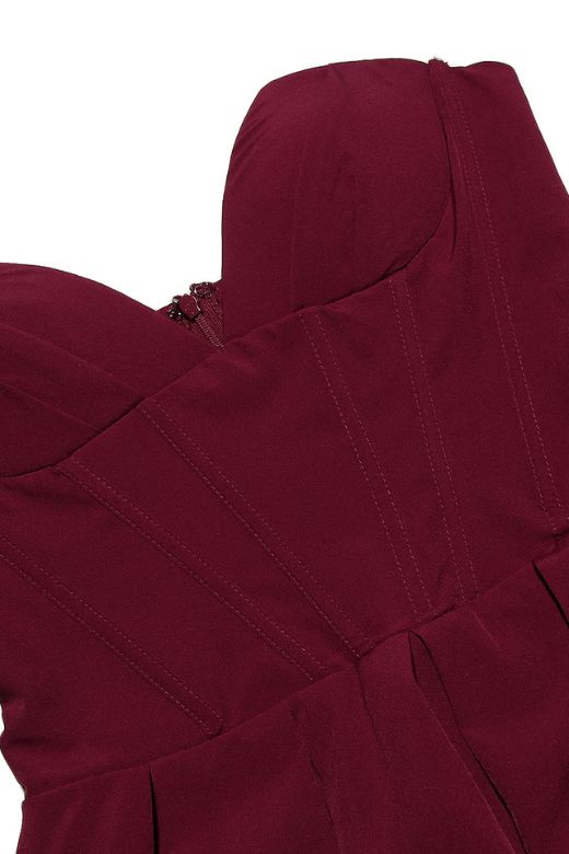 Woman wearing a figure flattering Gabbi Bodycon Midi Dress - Red Wine BODYCON COLLECTION