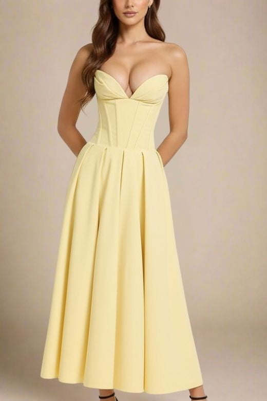 Woman wearing a figure flattering Gabbi Bodycon Midi Dress - Sun Yellow BODYCON COLLECTION