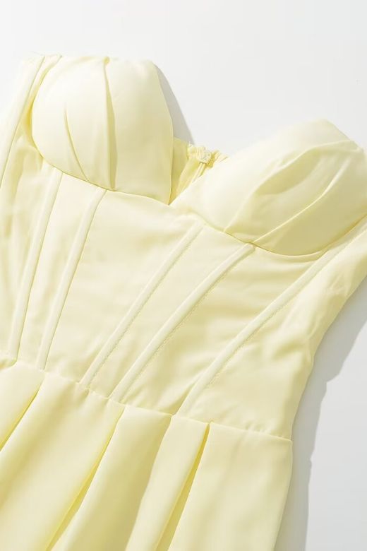 Woman wearing a figure flattering Gabbi Bodycon Midi Dress - Sun Yellow BODYCON COLLECTION