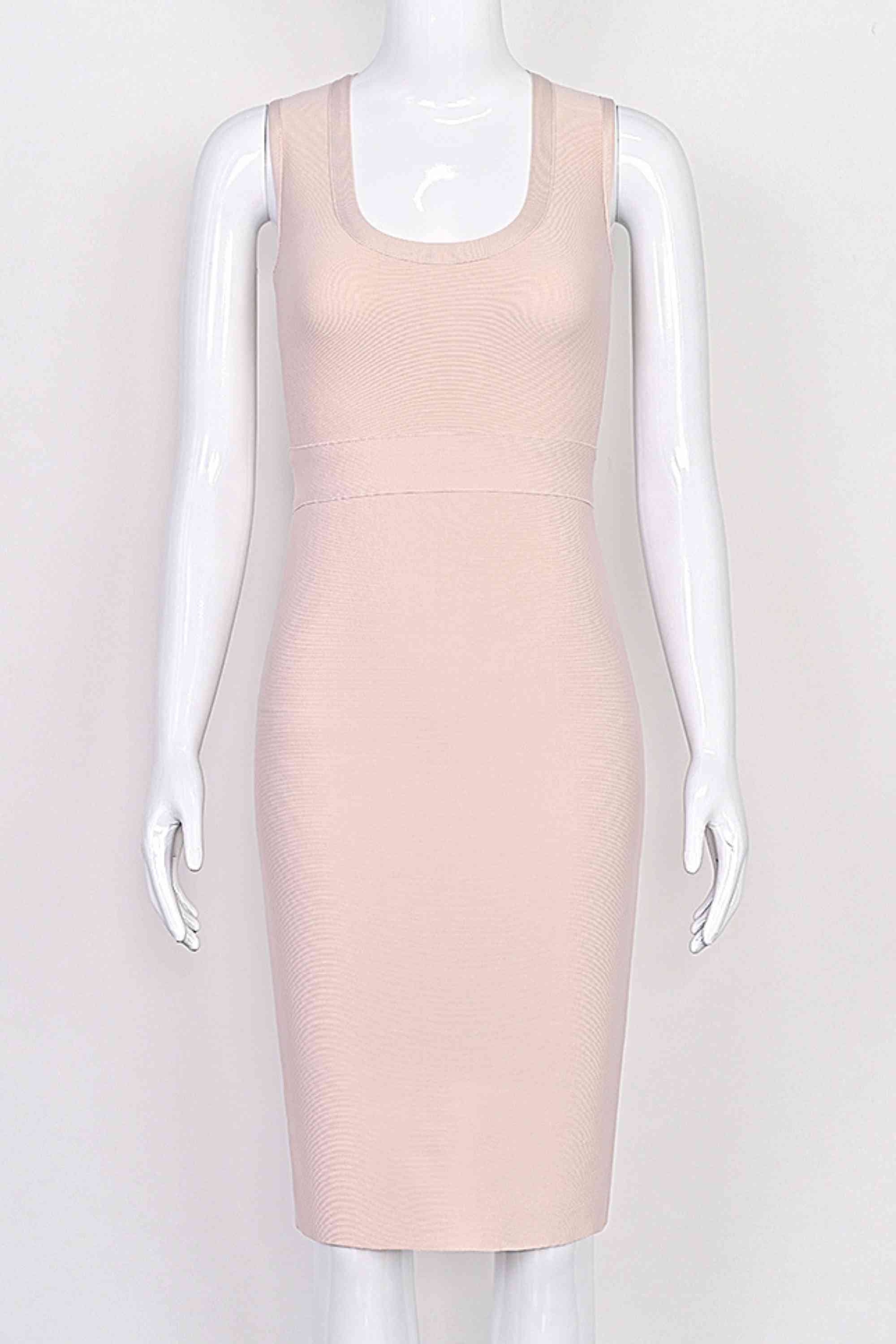 Woman wearing a figure flattering Gracie Bandage Dress - Cream BODYCON COLLECTION Pty Ltd