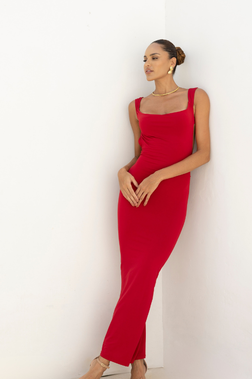 Woman wearing a figure flattering Harper Bodycon Maxi Dress - Classic Black BODYCON COLLECTION