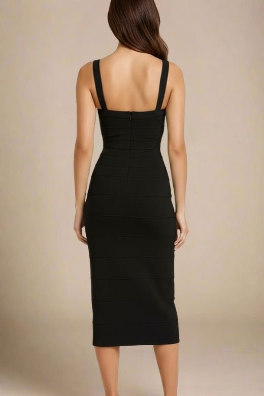 Woman wearing a figure flattering  Heidi Bandage Midi Dress - Classic Black Bodycon Collection