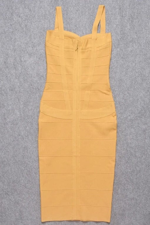Woman wearing a figure flattering Heidi Bandage Midi Dress - Mustard Yellow Bodycon Collection
