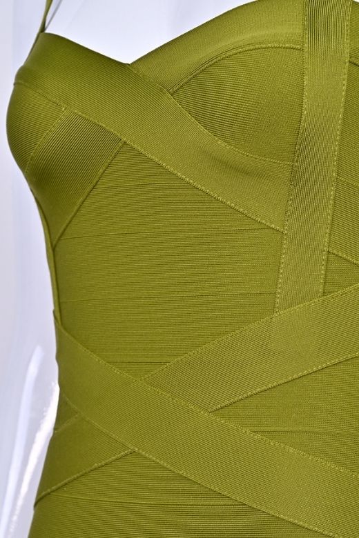 Woman wearing a figure flattering Heidi Bandage Midi Dress - Olive Green Bodycon Collection