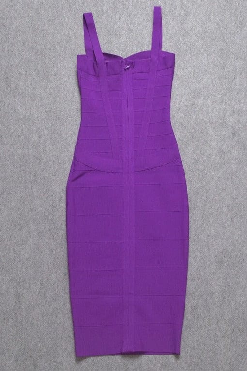 Woman wearing a figure flattering Heidi Bandage Midi Dress - Plum Purple Bodycon Collection
