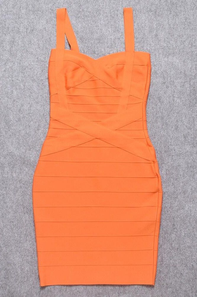 Woman wearing a figure flattering  Heidi Bandage Mini Dress - Apricot Orange Bodycon Collection