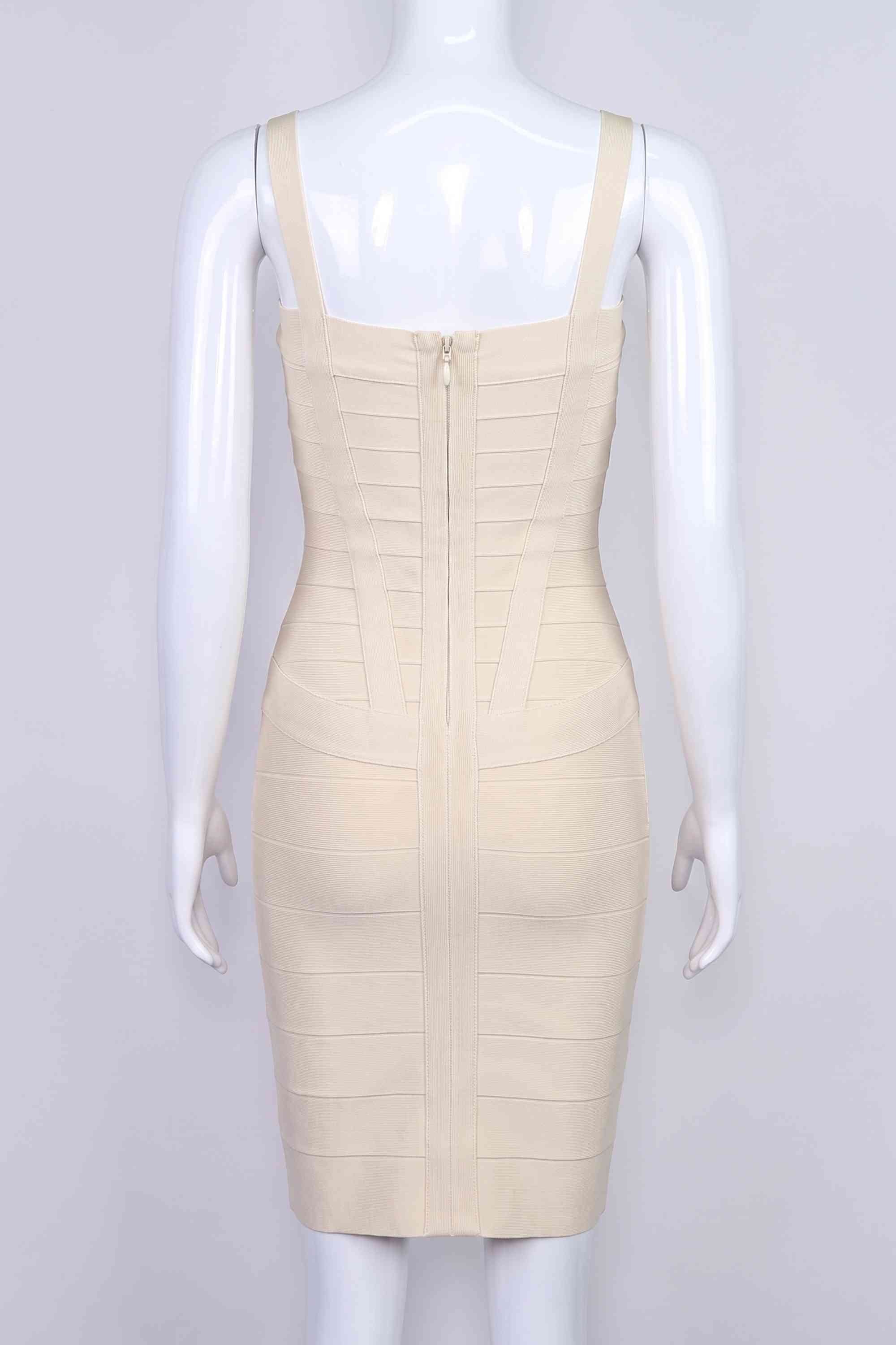 Woman wearing a figure flattering Heidi Bandage Mini Dress - Cream Bodycon Collection