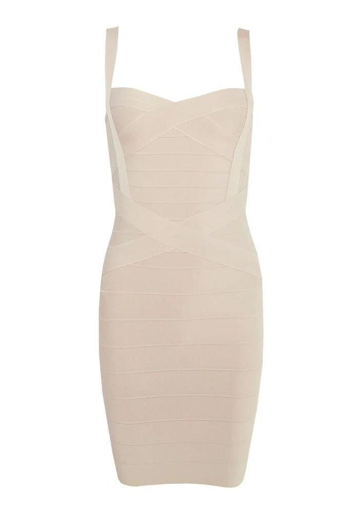 Woman wearing a figure flattering  Heidi Bandage Mini Dress - Cream Bodycon Collection