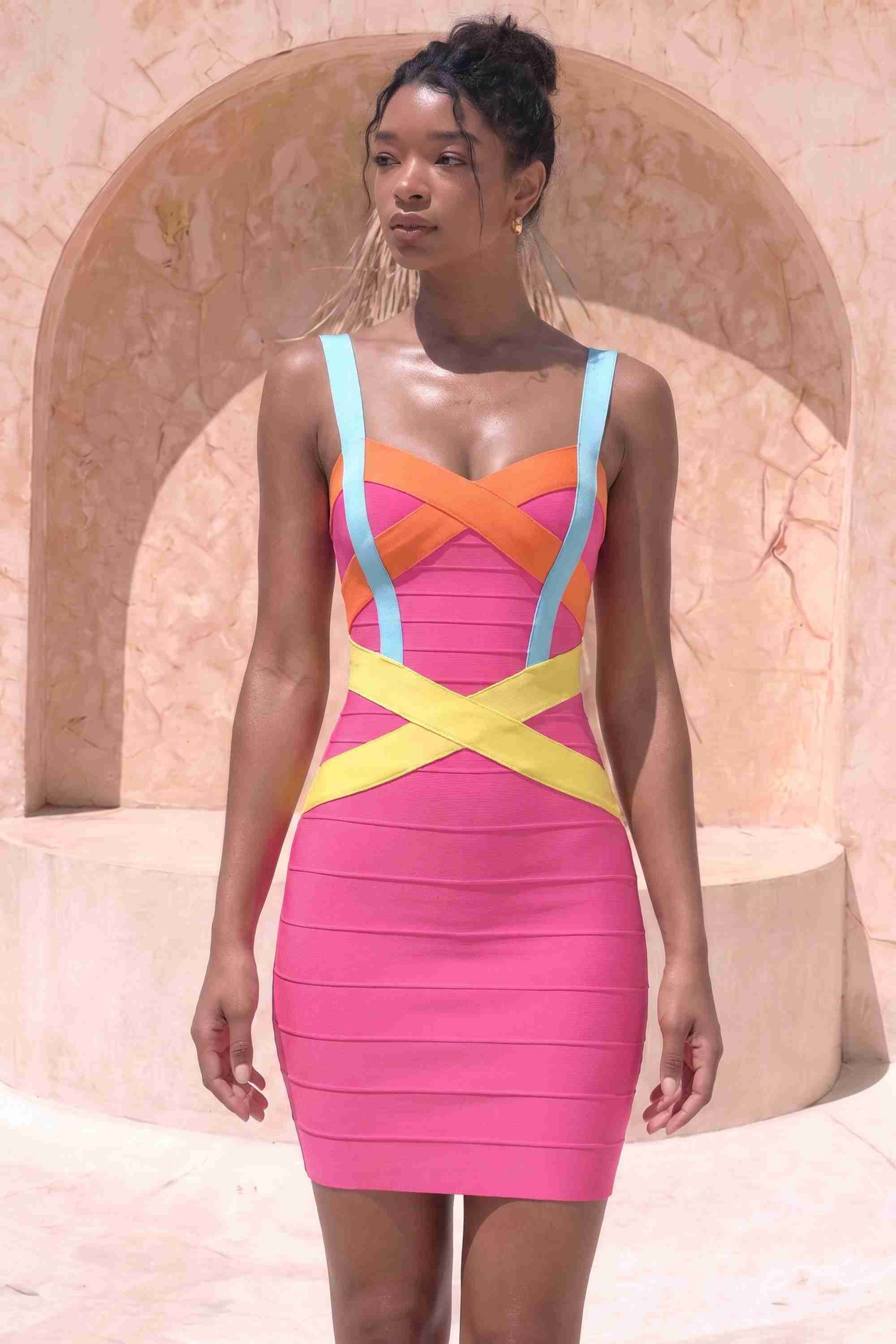 Woman wearing a figure flattering Heidi Bandage Mini Dress - Hot Pink Bodycon Collection