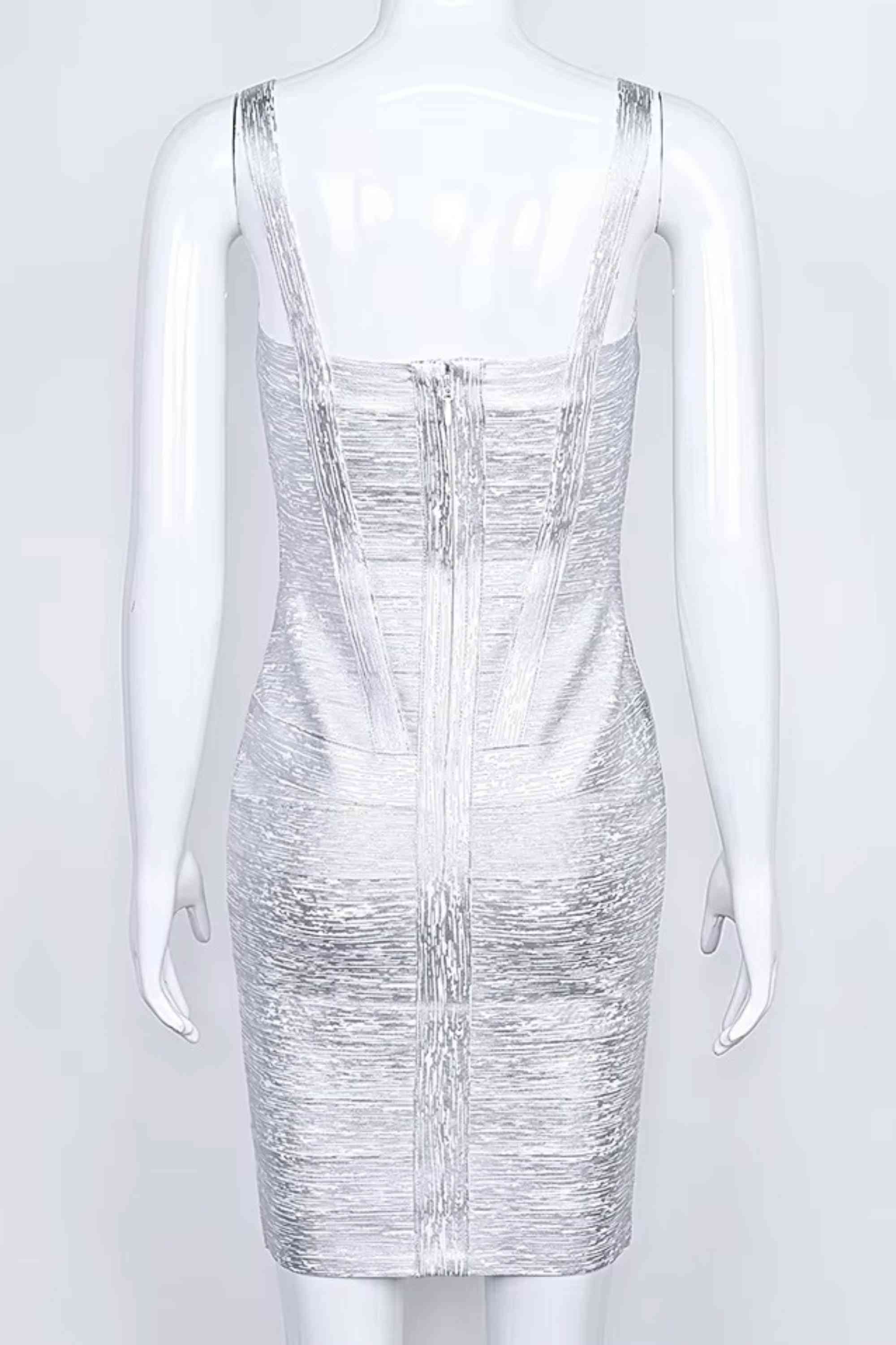 Woman wearing a figure flattering Heidi Bandage Mini Dress - Silver Bodycon Collection