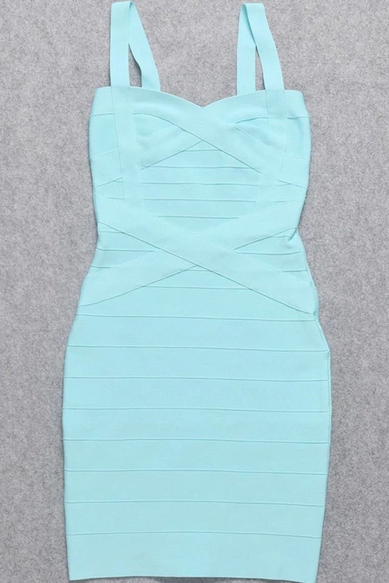 Woman wearing a figure flattering  Heidi Bandage Mini Dress - Sky Blue Bodycon Collection