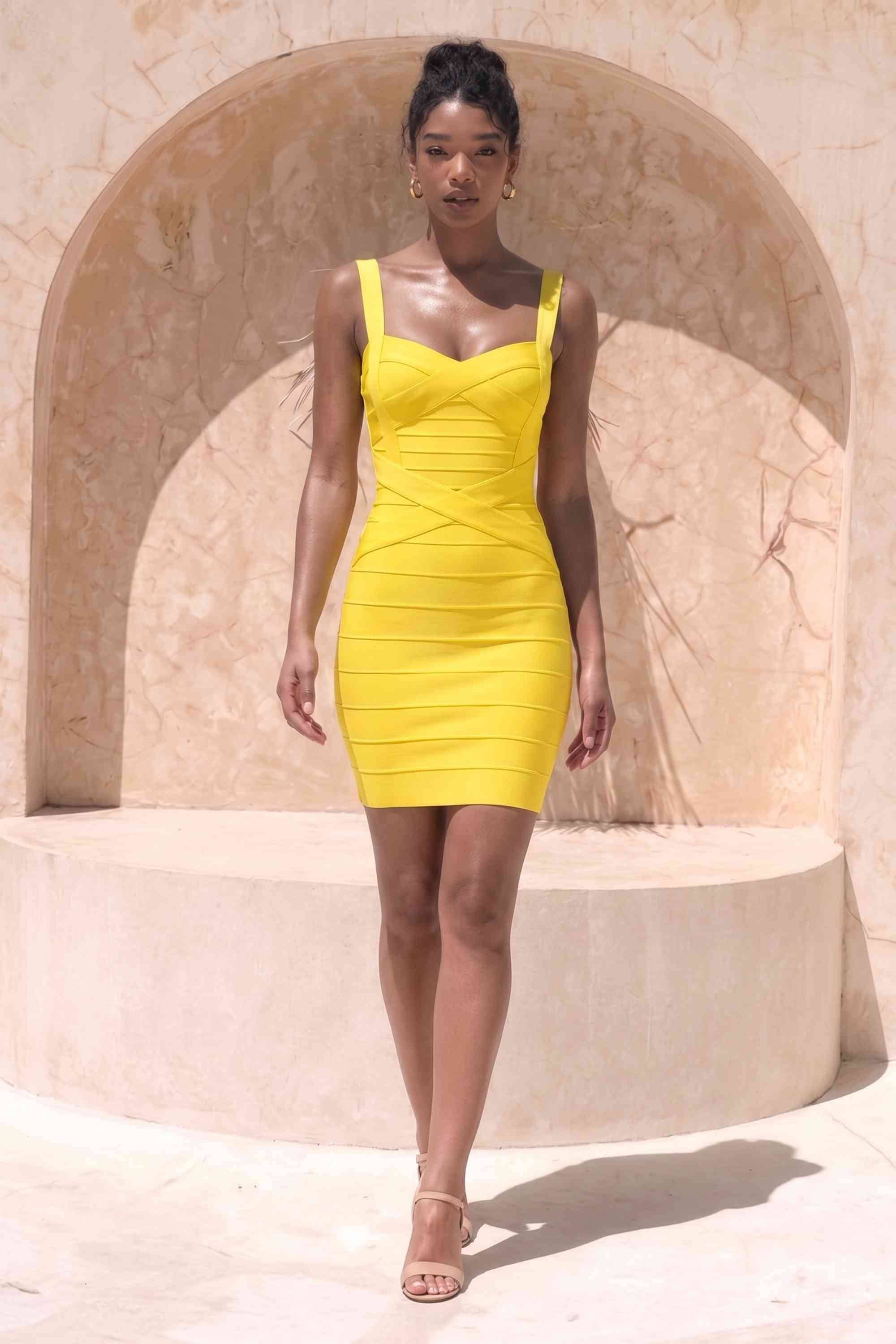 Woman wearing a figure flattering Heidi Bandage Mini Dress - Sun Yellow Bodycon Collection
