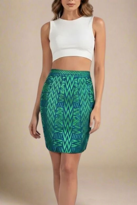 Woman wearing a figure flattering High Waist Metallic Mini Skirt - Emerald Green BODYCON COLLECTION