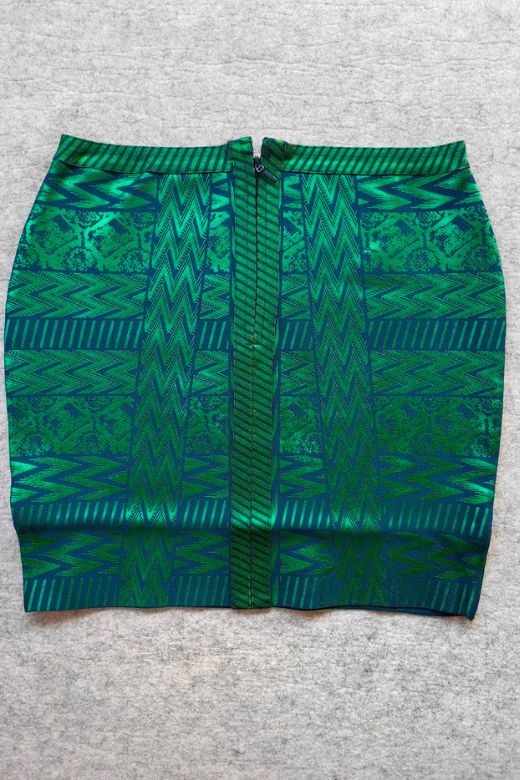Woman wearing a figure flattering High Waist Metallic Mini Skirt - Emerald Green BODYCON COLLECTION