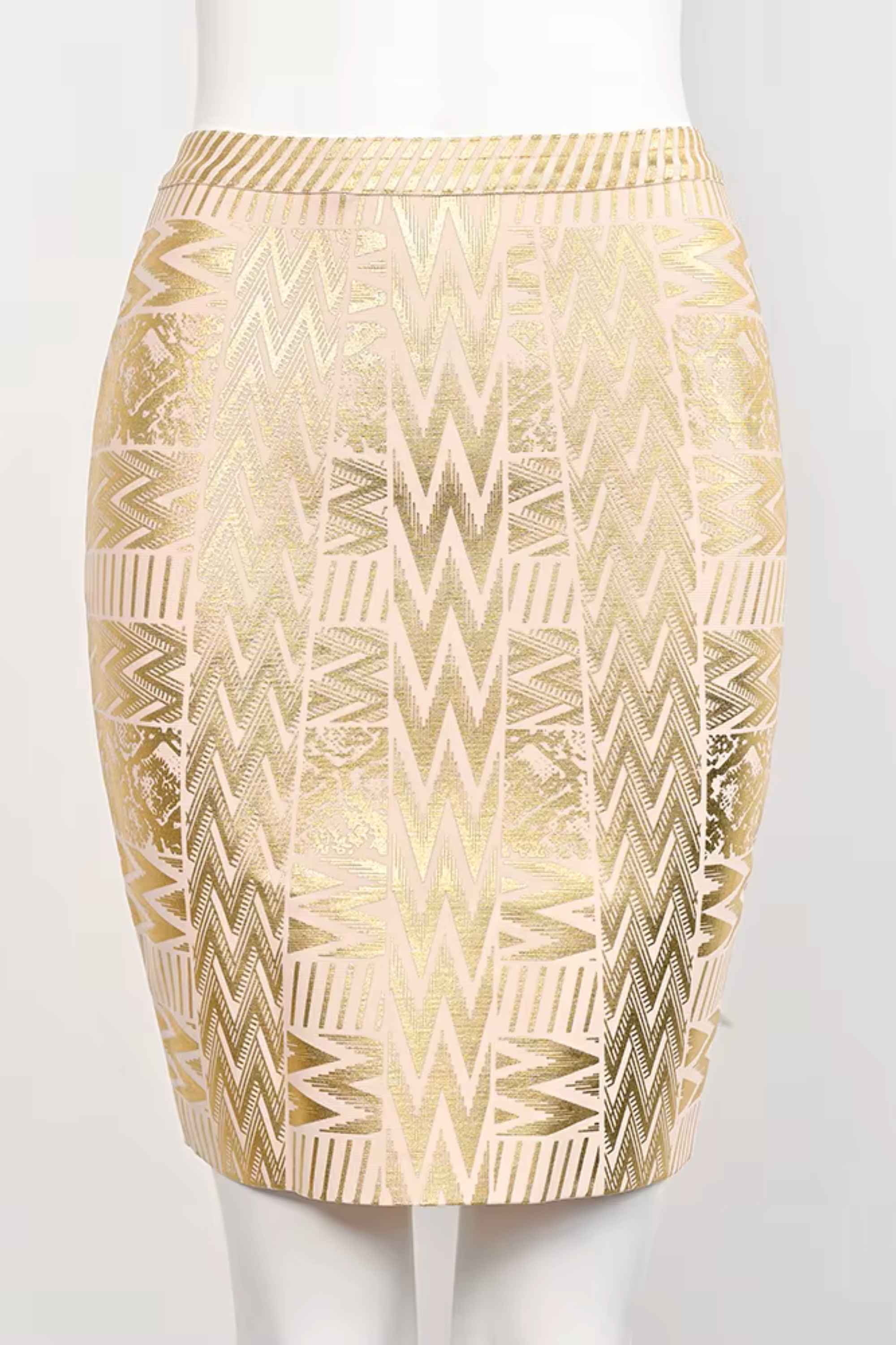 Woman wearing a figure flattering High Waist Metallic Mini Skirt - Gold BODYCON COLLECTION