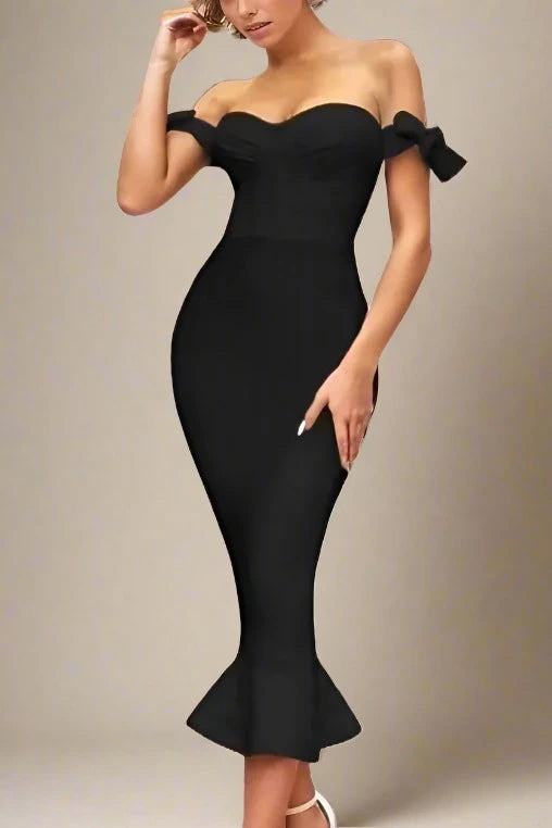 Woman wearing a figure flattering  Hunter Bandage Midi Dress - Classic Black BODYCON COLLECTION