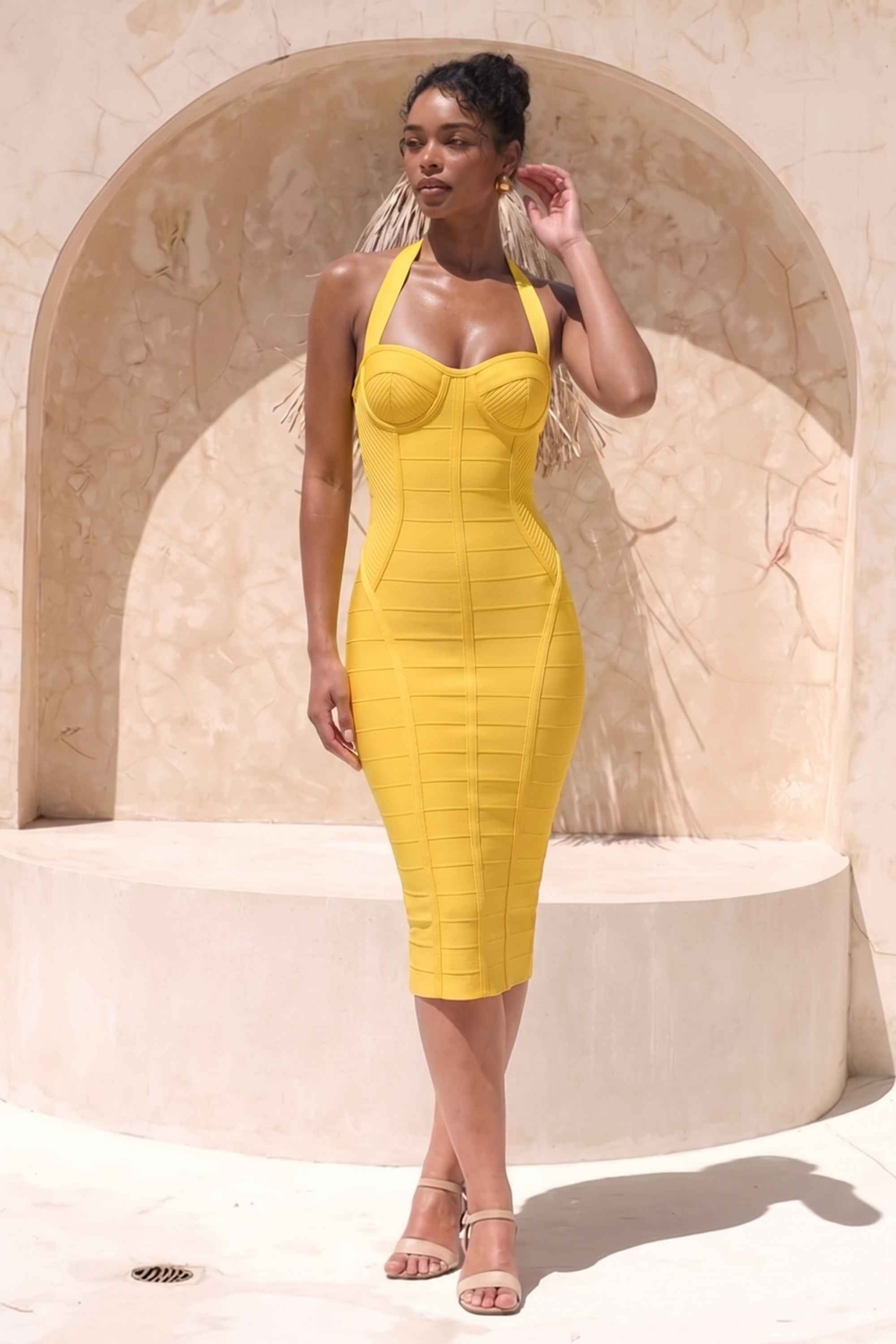 Woman wearing a figure flattering Isabella Bandage Midi Dress - Mustard Yellow BODYCON COLLECTION Pty Ltd