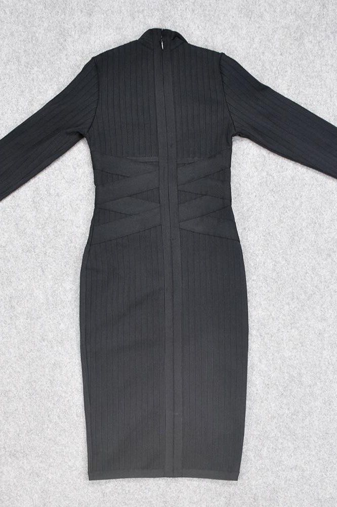 Woman wearing a figure flattering Jane Long Sleeve Bodycon Midi Dress - Classic Black Bodycon Collection