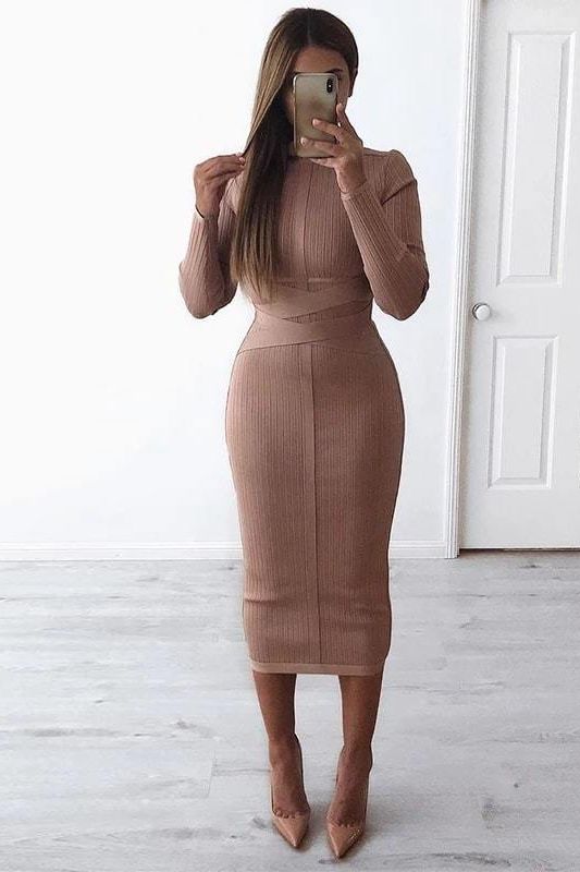Woman wearing a figure flattering Jane Long Sleeve Bodycon Midi Dress - Lipstick Red Bodycon Collection