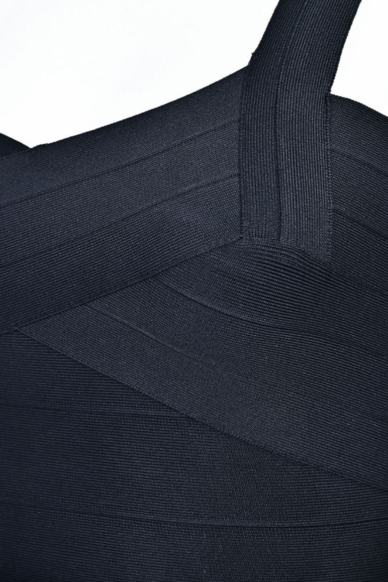 Woman wearing a figure flattering Jay Bandage Crop Top - Classic Black BODYCON COLLECTION