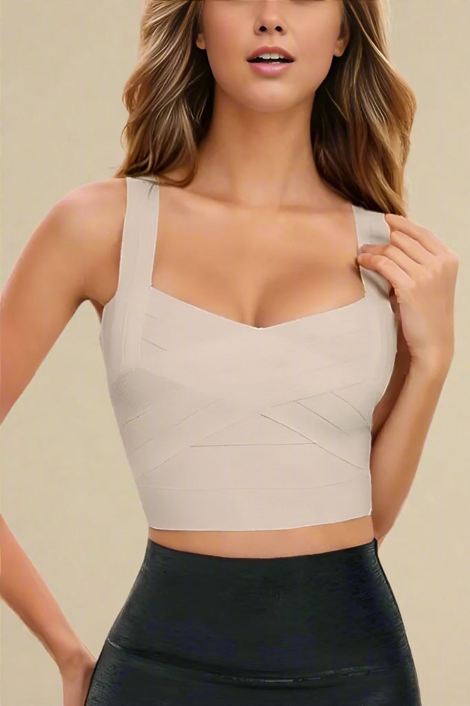 Woman wearing a figure flattering  Jay Bandage Crop Top - Cream BODYCON COLLECTION