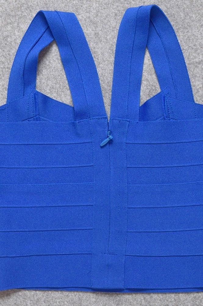 Woman wearing a figure flattering Jay Bandage Crop Top - Royal Blue BODYCON COLLECTION