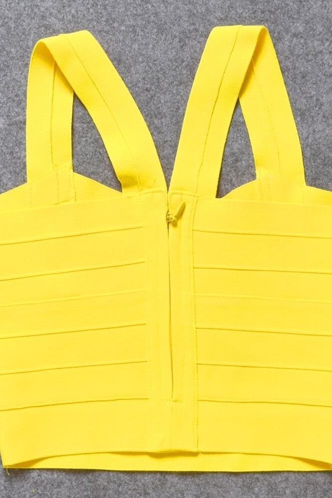 Woman wearing a figure flattering Jay Bandage Crop Top - Sun Yellow BODYCON COLLECTION