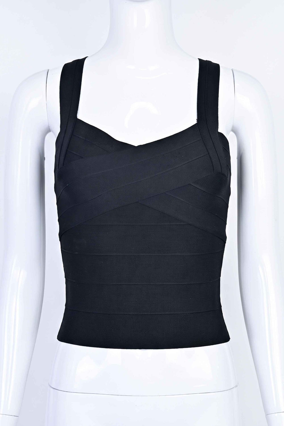 Woman wearing a figure flattering Jay Bandage Top - Classic Black BODYCON COLLECTION