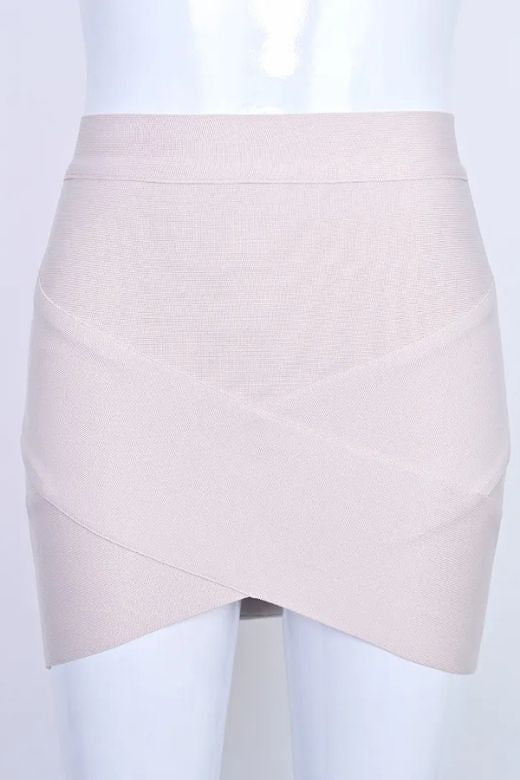 Woman wearing a figure flattering Jay High Waist Bandage Mini Skirt - Cream BODYCON COLLECTION