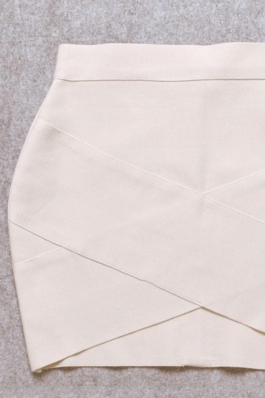 Woman wearing a figure flattering  Jay High Waist Bandage Mini Skirt - Cream BODYCON COLLECTION