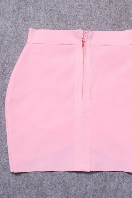 Woman wearing a figure flattering Jay High Waist Bandage Mini Skirt - Dusty Pink BODYCON COLLECTION