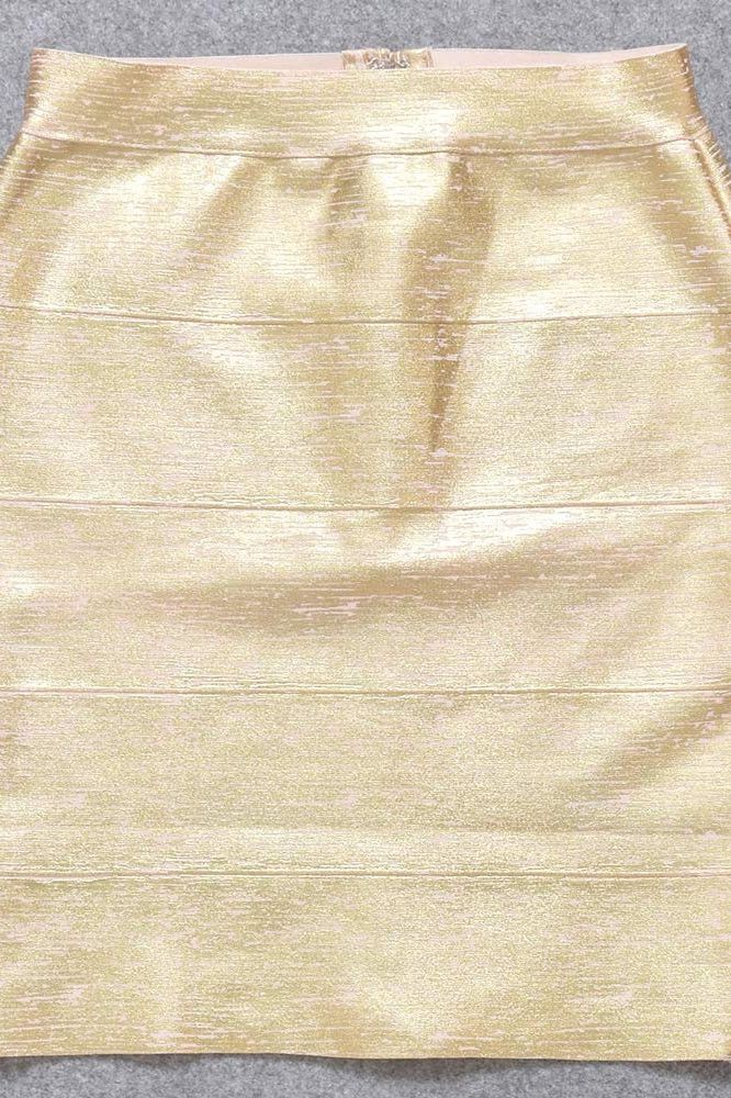 Woman wearing a figure flattering Jess Bandage Top and Mini Skirt Set - Gold BODYCON COLLECTION