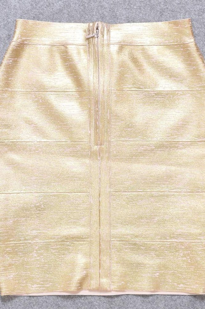 Woman wearing a figure flattering Jess Bandage Top and Mini Skirt Set - Gold BODYCON COLLECTION