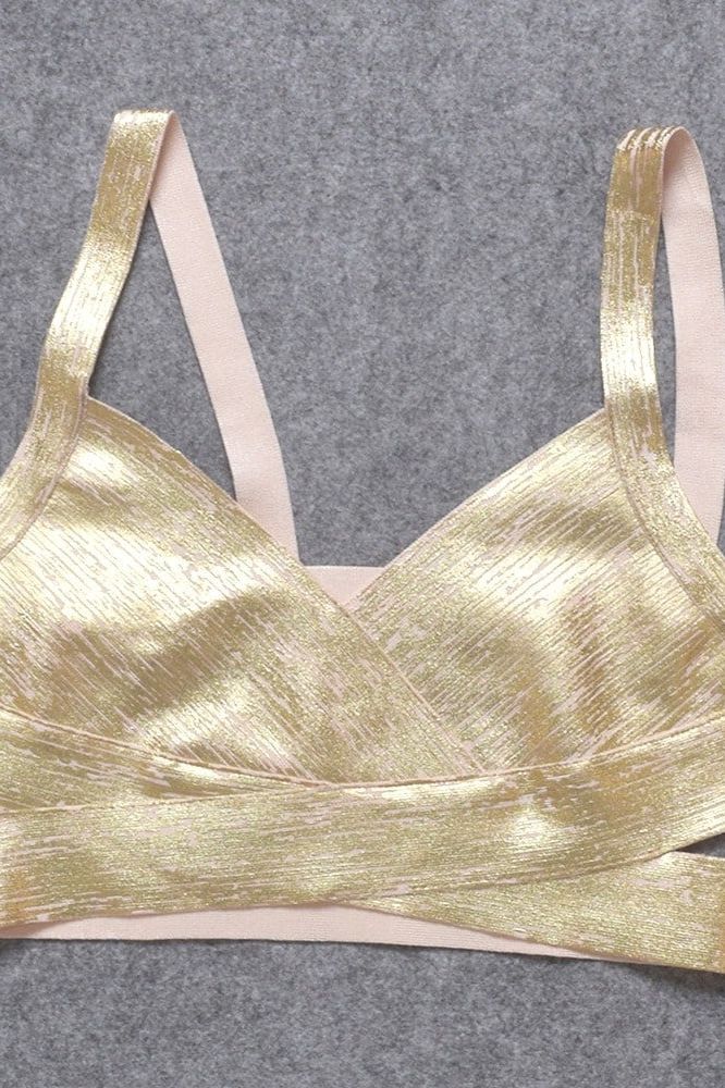 Woman wearing a figure flattering Jess Bandage Top and Mini Skirt Set - Gold BODYCON COLLECTION