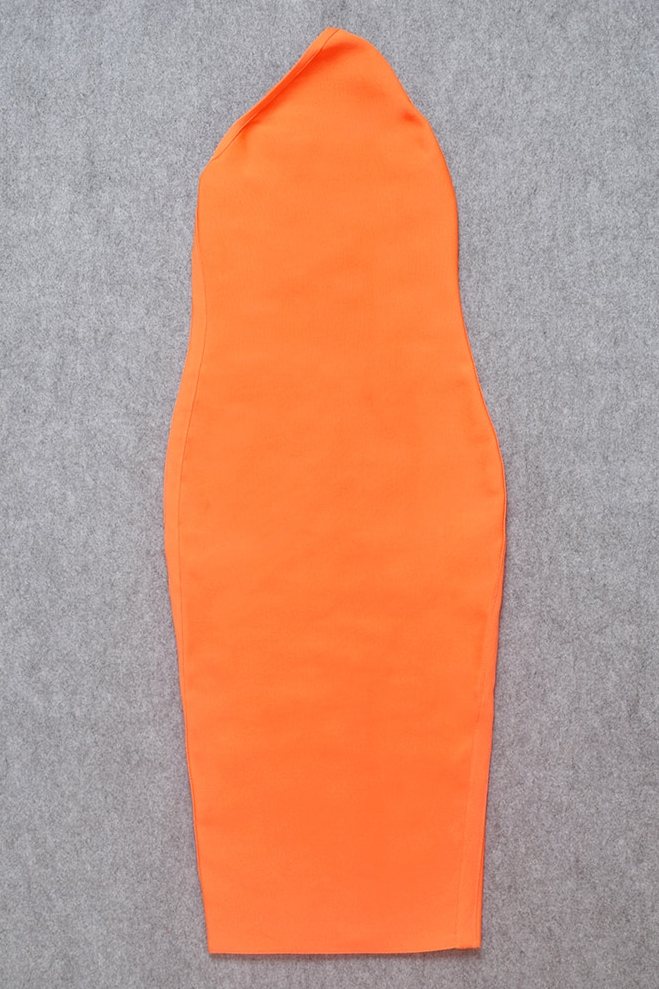 Woman wearing a figure flattering Joi Bodycon Midi Dress - Apricot Orange Bodycon Collection