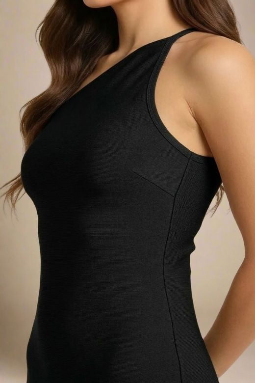 Woman wearing a figure flattering Joi Bodycon Midi Dress - Classic Black Bodycon Collection