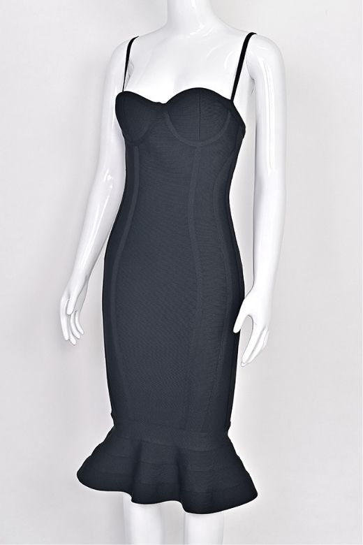 Woman wearing a figure flattering Joy Bandage Midi Dress - Classic Black Bodycon Collection