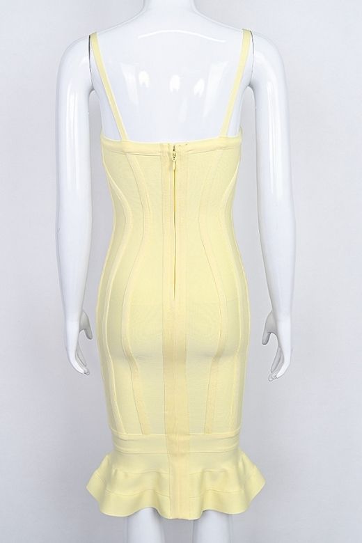Woman wearing a figure flattering Joy Bandage Midi Dress - Sun Yellow Bodycon Collection