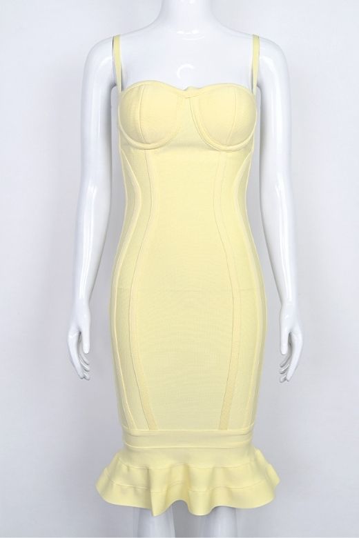Woman wearing a figure flattering Joy Bandage Midi Dress - Sun Yellow Bodycon Collection