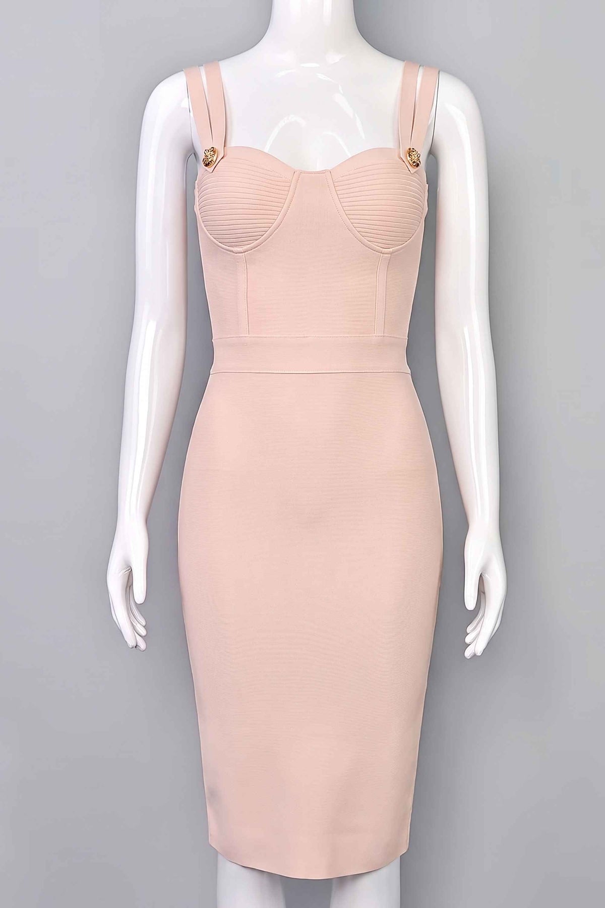 Woman wearing a figure flattering Kate Bandage Dress - Nude Bodycon Collection