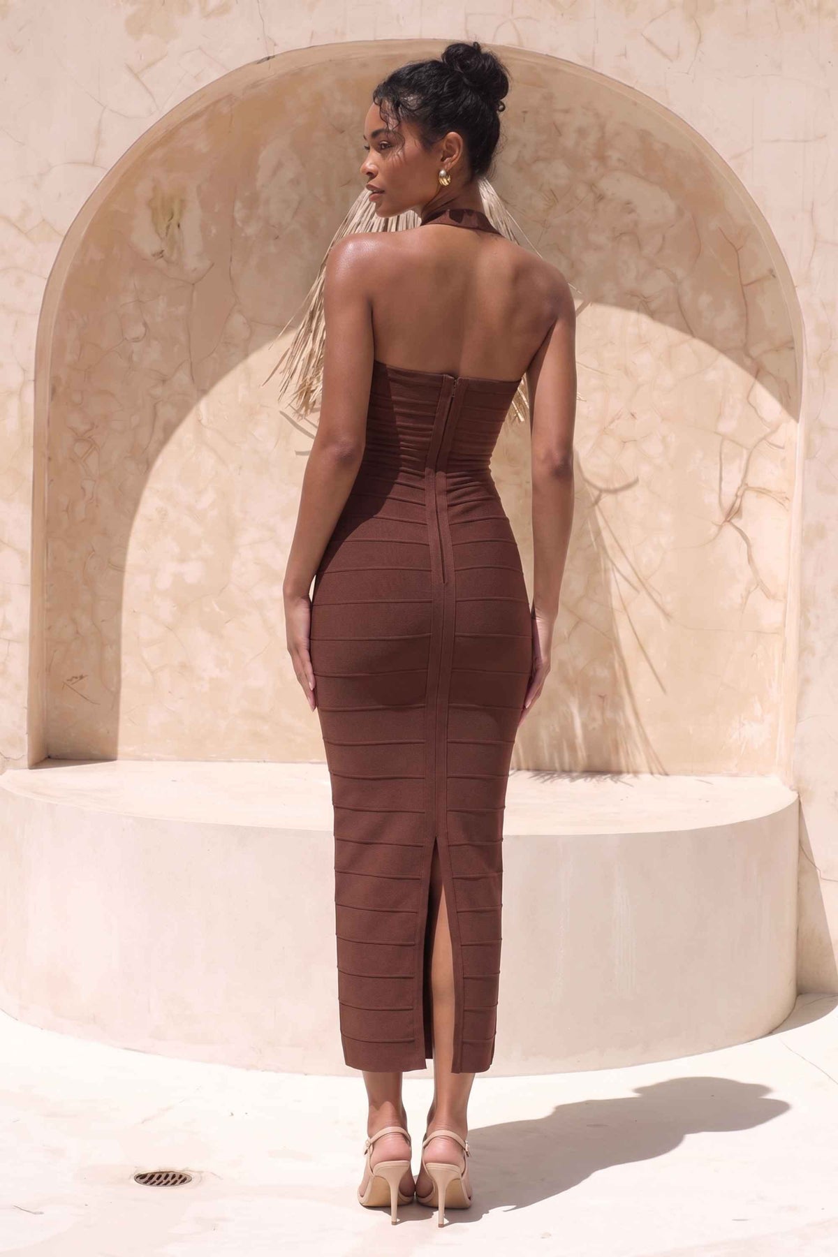 Woman wearing a figure flattering Kia Bandage Maxi Dress - Chocolate Brown BODYCON COLLECTION Pty Ltd