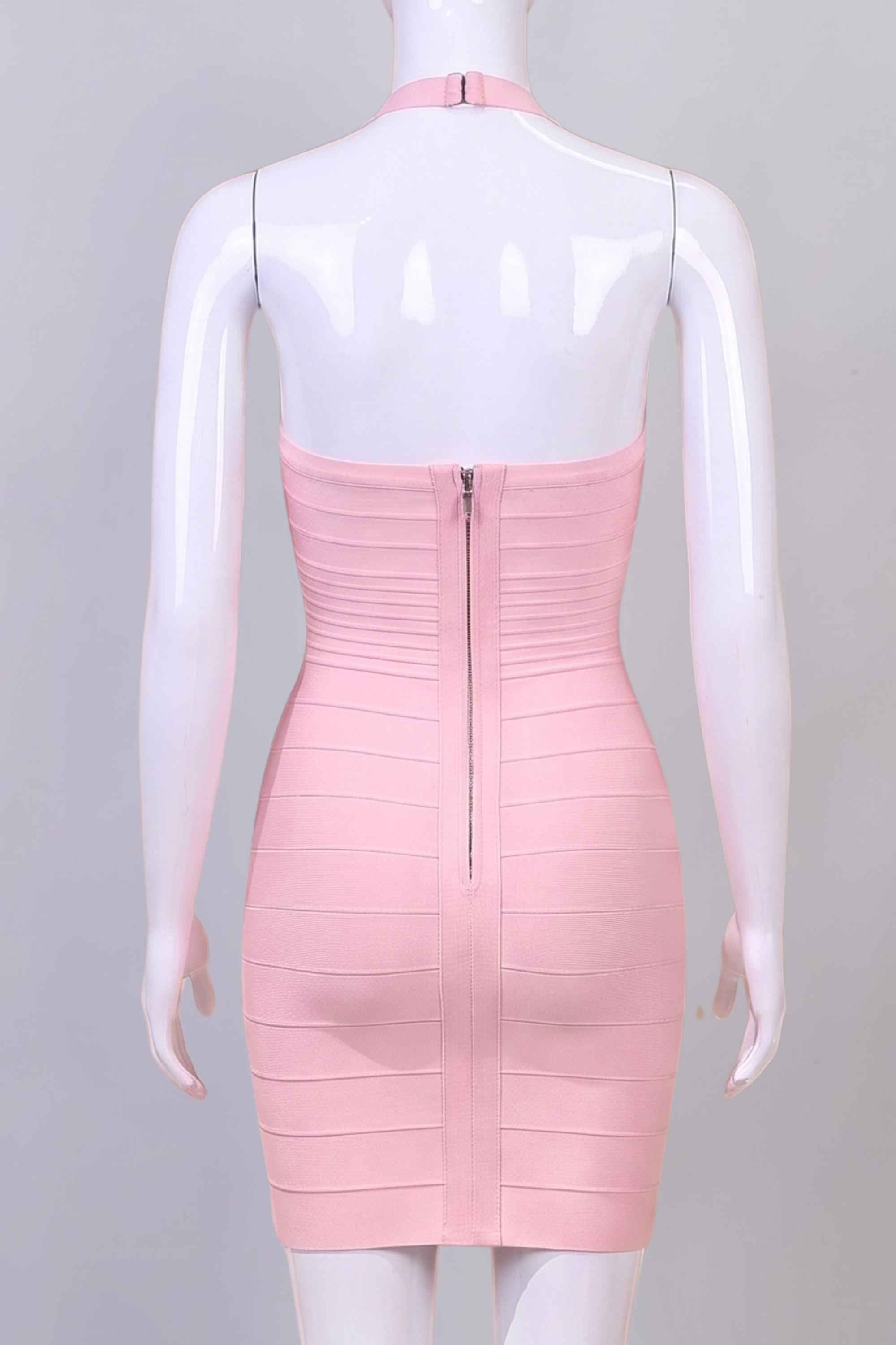 Woman wearing a figure flattering Kia Bandage Mini Dress - Dusty Pink BODYCON COLLECTION Pty Ltd