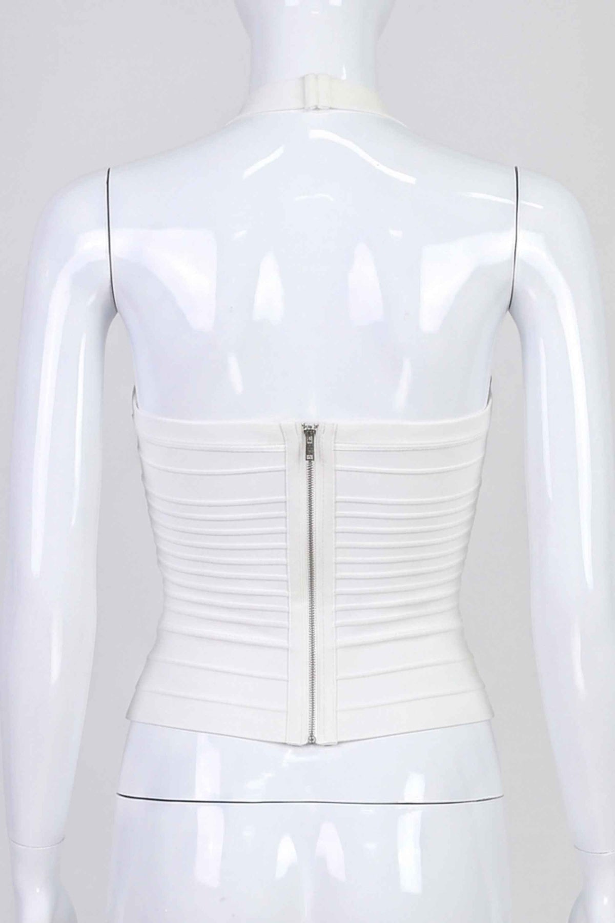 Woman wearing a figure flattering Kia Bandage Top - Pearl White BODYCON COLLECTION Pty Ltd