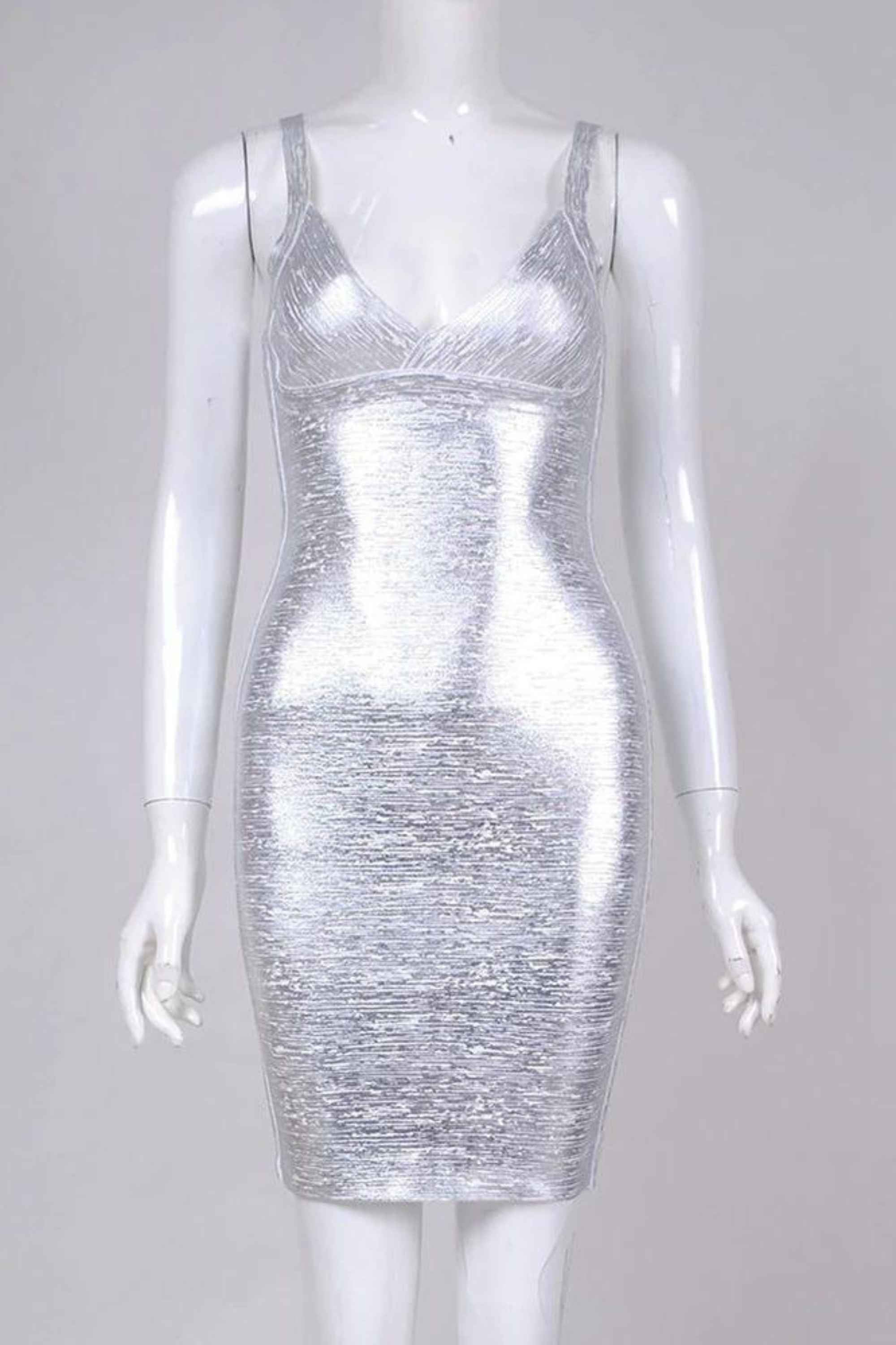 Woman wearing a figure flattering Kit Bandage Dress - Silver Bodycon Collection