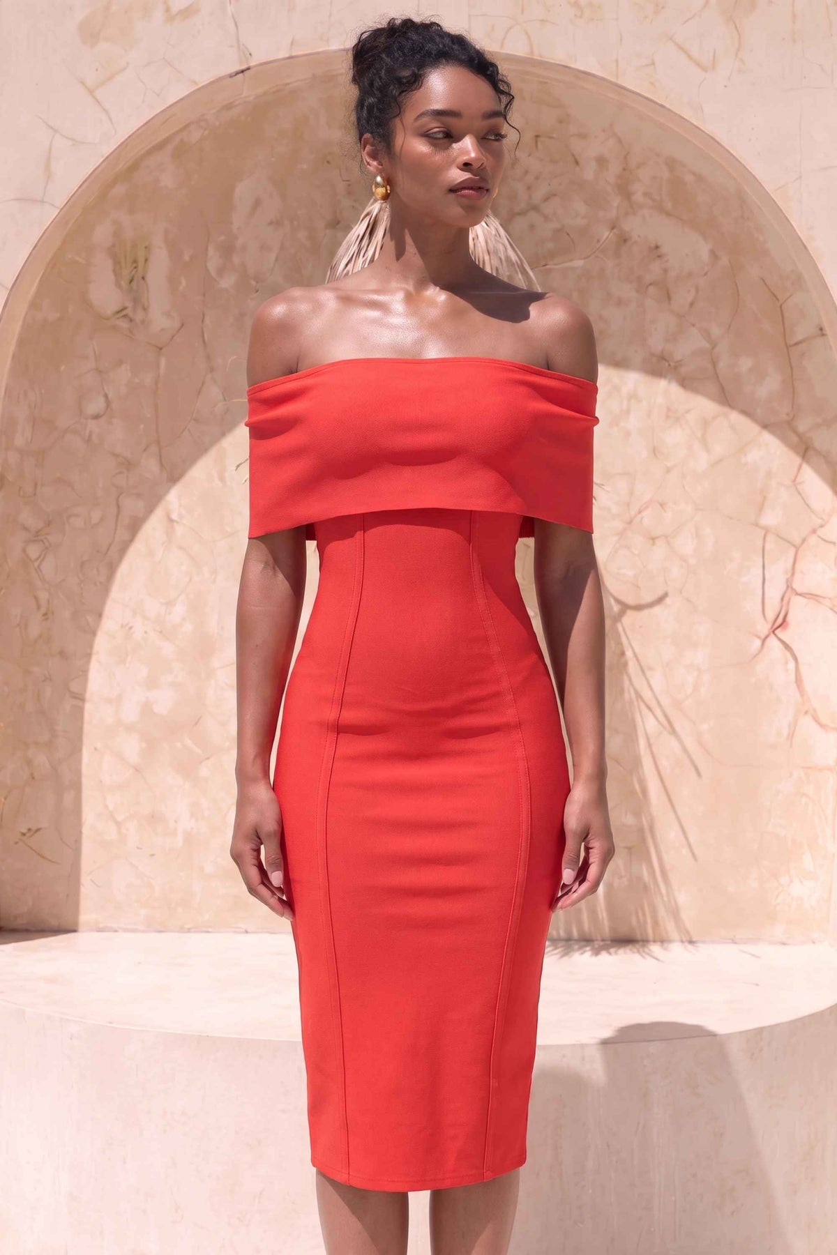 Woman wearing a figure flattering Kristina Bodycon Dress Dress - Lipstick Red BODYCON COLLECTION
